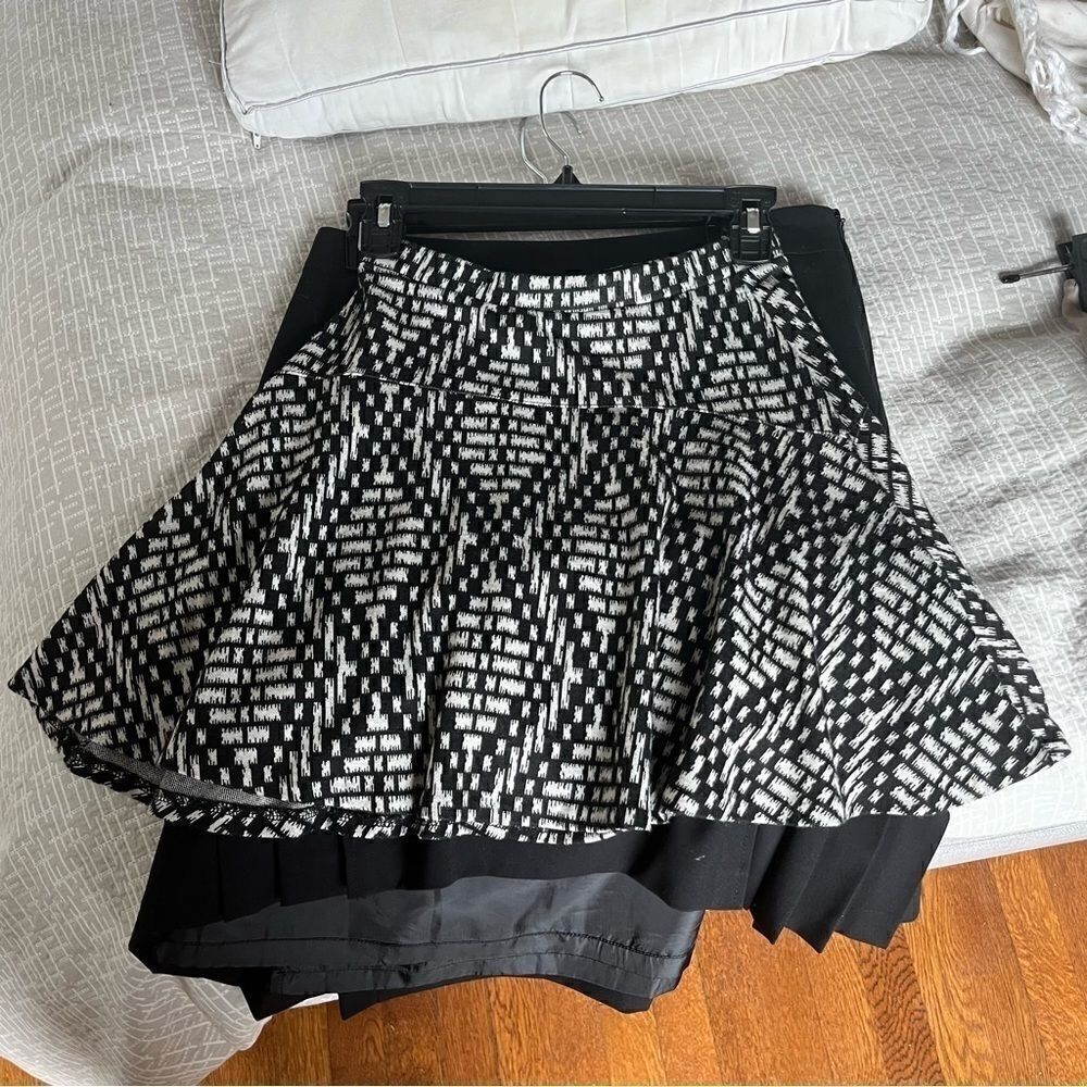 Aqua(Bloomingdales) black and white patterned circle skirt.